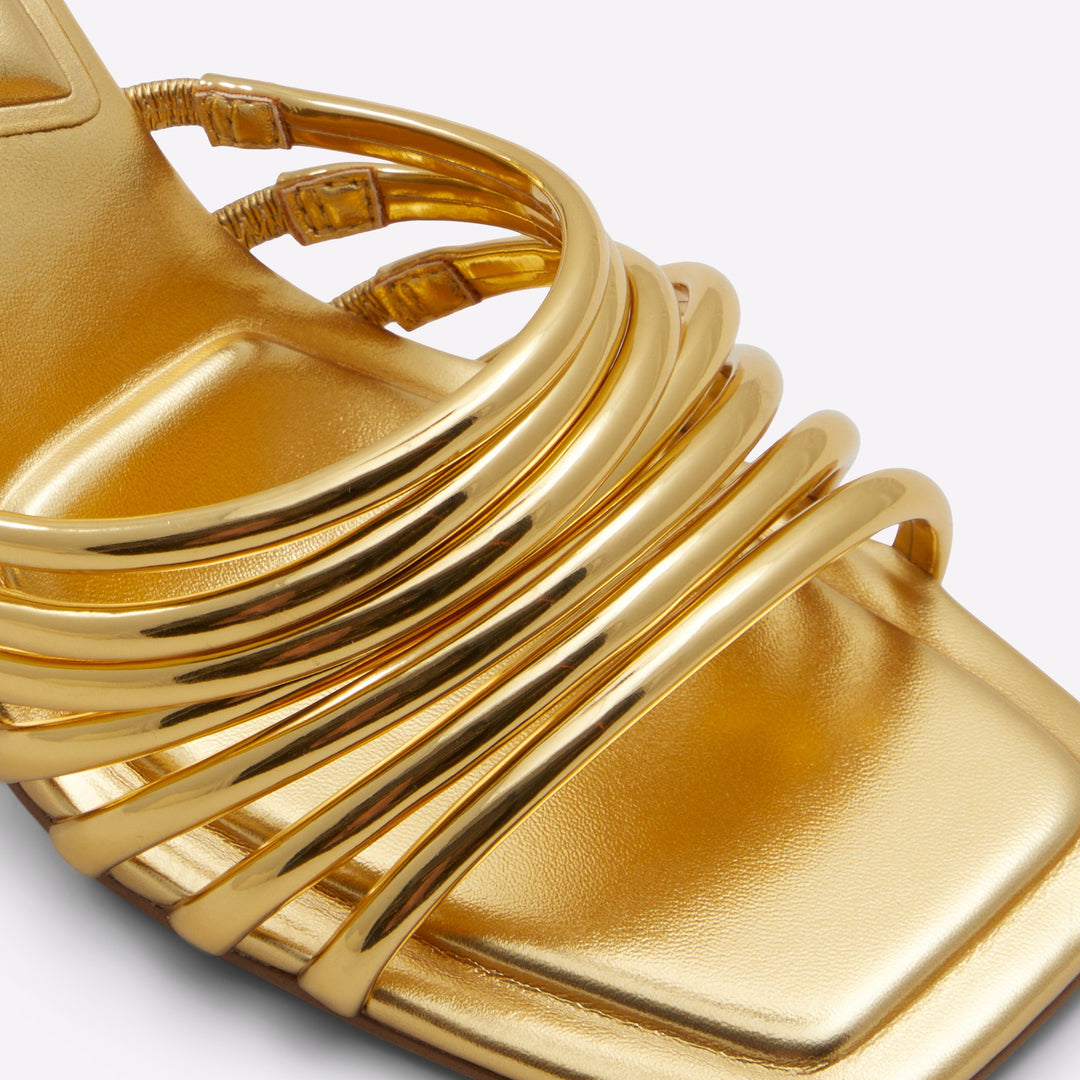 Mules em dourado, salto fino - HARPA