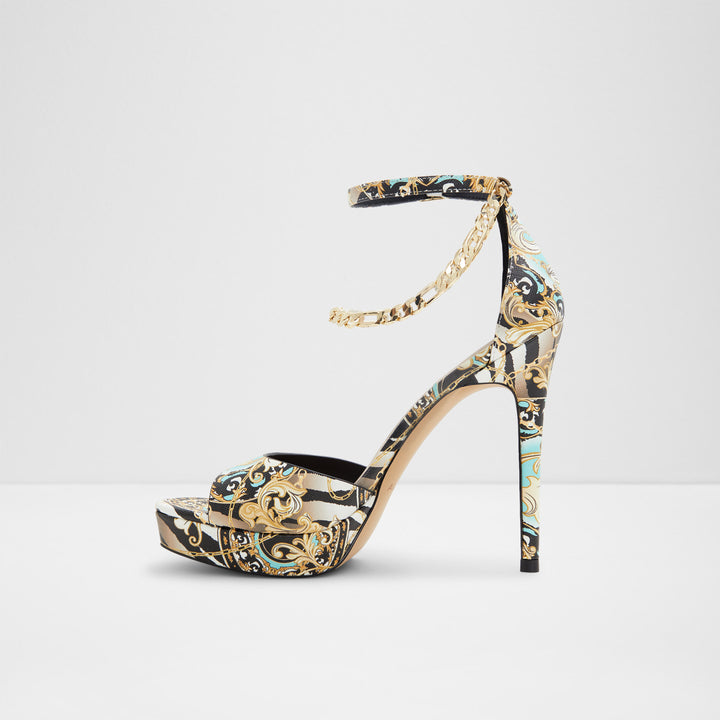 Sandálias em preto e dourado, salto fino com plataforma - PRISILLA