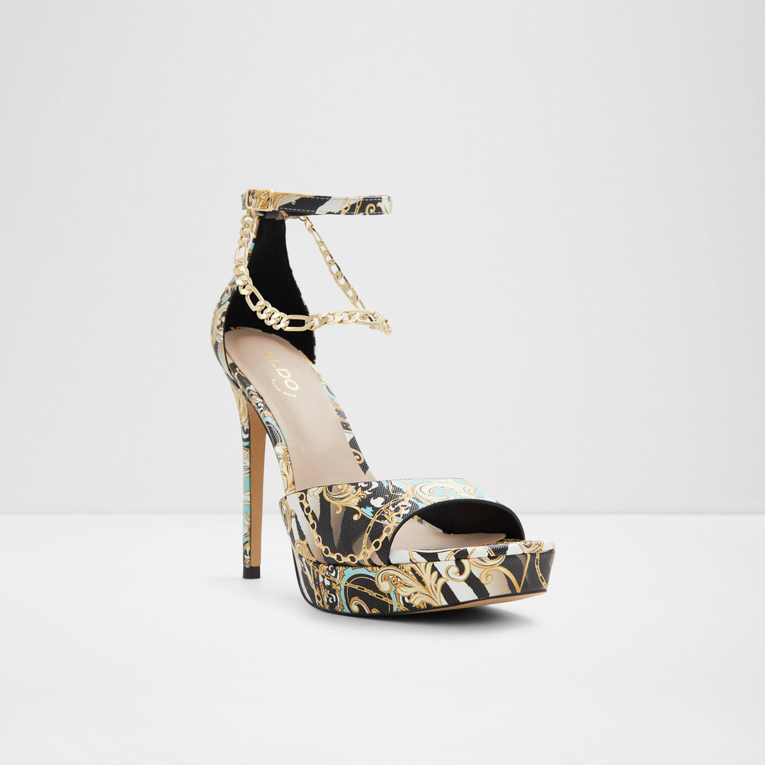 Sandálias em preto e dourado, salto fino com plataforma - PRISILLA